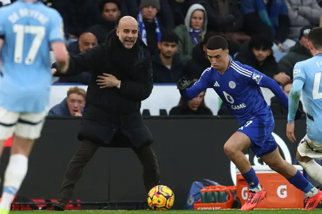 Pep Guardiola (C) gestures