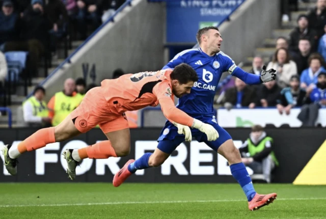 Manchester City's Stefan Ortega in action with Leicester City's Jamie Vardy