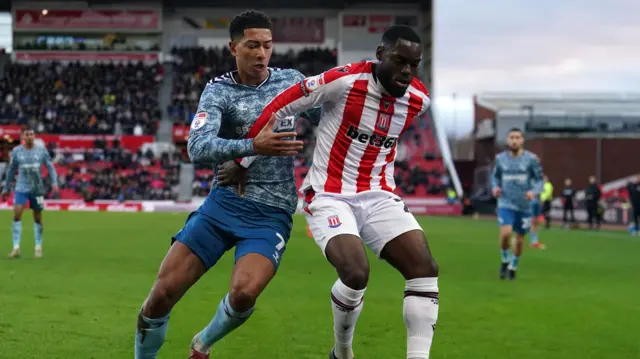 Stoke's Junior Tchamadeu holds off Sunderland's Jobe Bellingham