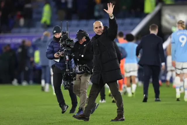 Manchester City manager Pep Guardiola waves