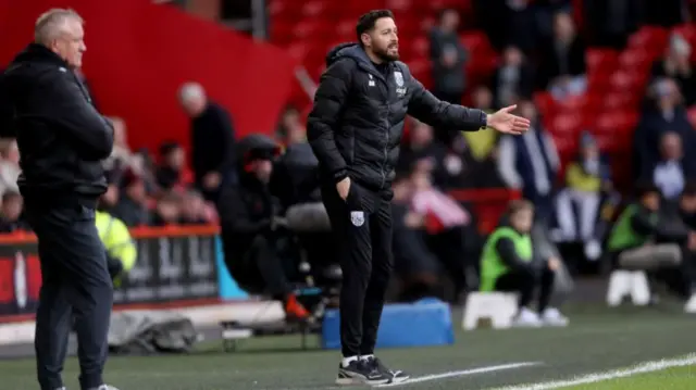 West Brom coach Damia Abella on the touchline at Bramall Lane