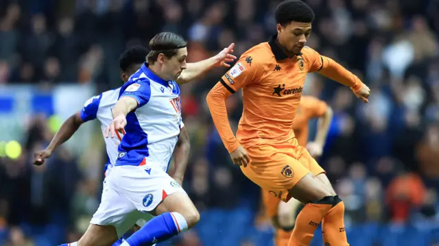 Hull City's Mason Burstow is challenged by Blackburn Rovers' Callum Brittain