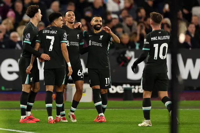 Trent Alexander-Arnold (C) celebrates