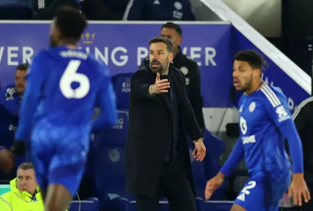 Van Nistelrooy gestures instructions to his players from the touchline