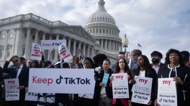 People gather for a press conference about their opposition to a TikTok ban on Capitol Hill in Washington, DC on March 22, 2023.