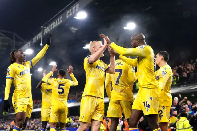 Palace players celebrate with Mateta after his goal