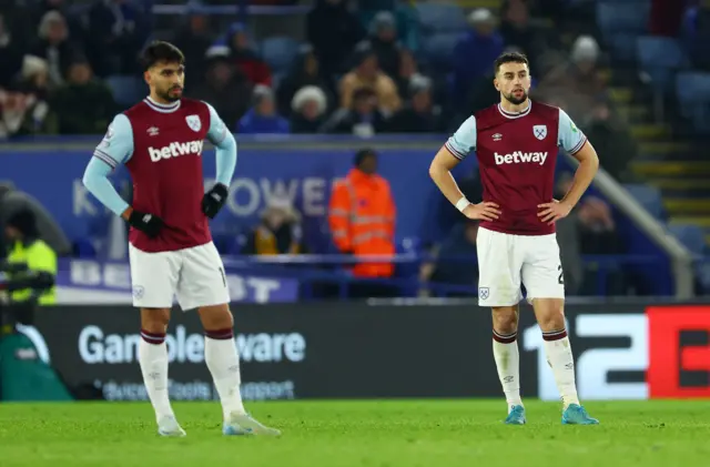 Paqueta and Kilman stand with their hands on their hips