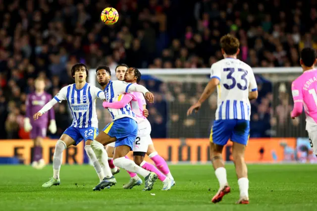 Georginio Rutter(L) of Brighton and Hove Albion and Kyle Walker-Peters of Southampton during the Premier League match between Brighton & Hove Albion FC and Southampton FC