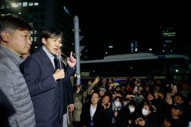 Cho Kuk, the leader of the Rebuilding Korea Party, stands in front of the National Assembly to address citizens about the emergency martial law incident that takes place there today. Leader Jo explains that by the morning of December 4, 2024, in Seoul, South Korea, he will submit an impeachment motion against President Yoon Suk-yeol.