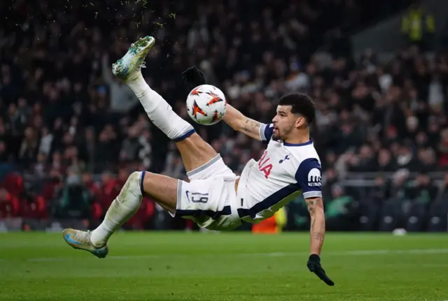 Dominic Solanke with his feet up in the air