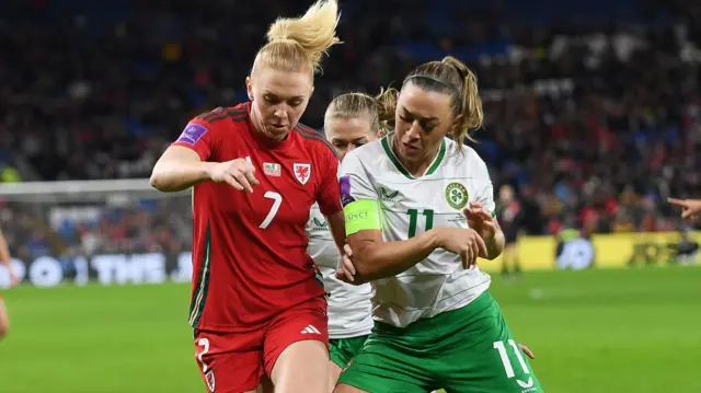 Katie McCabe of Republic of Ireland challenges Ceri Holland of Wales