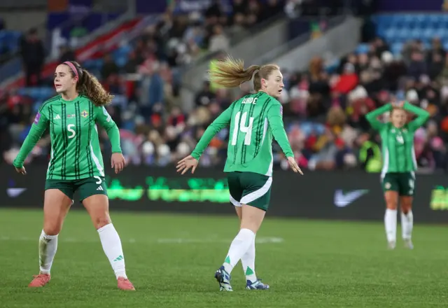 Lauren Wade reacts after a shot