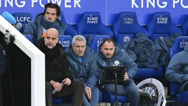 Pep Guardiola looks on during Man City's match against Leicester