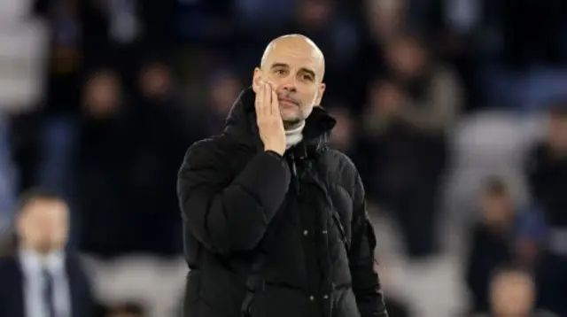 Pep Guardiola looks on after Man City beat Leicester 2-0