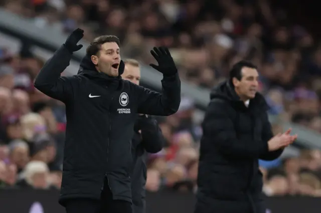 Fabian Hurzeler with his hands in the air and Unai Emery in the background