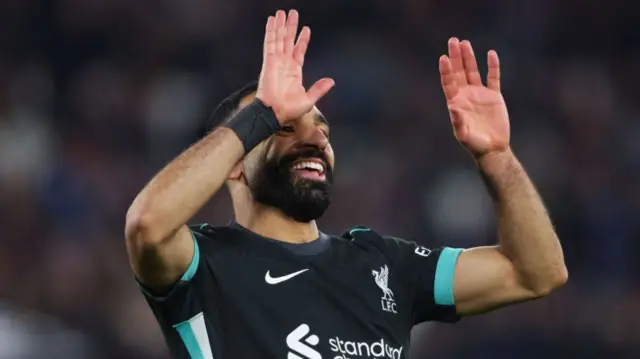 Salah celebrates after scoring for Liverpool against West Ham