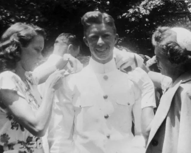 A handout photo provided by the Jimmy Carter Library shows a photo of former US President Jimmy Carter"s mother, Miss Lillian Carter (right), and his fiancee, Rosalynn Smith (left), pinning epaulets on Ensign Carter (C) at Jimmy Carter"s graduation from the Naval Academy, in Annapolis, Maryland, USA, 5th June 1946.