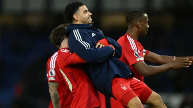 Forest players celebrate after beating Everton