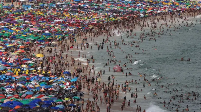 Aerial view of people visiting Copacabana Beach before a traditional New Year's Eve celebration in Rio de Janeiro, Brazil, December 31, 2024.