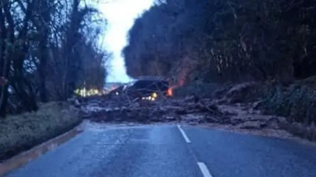 Very large pile of debris, covering both lanes of the A832