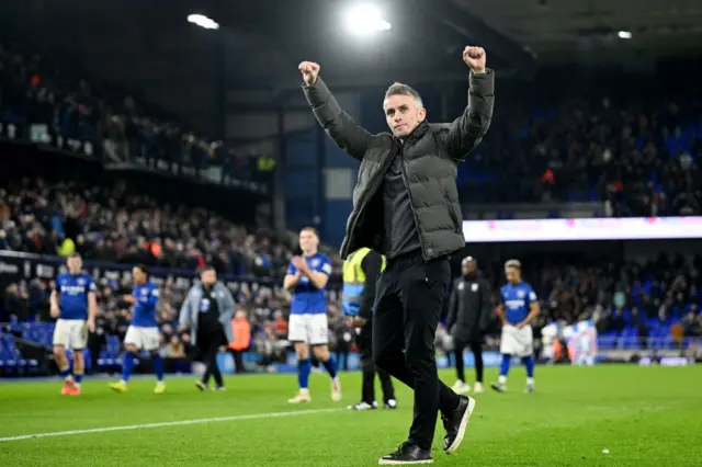 Ipswich manager Kieran McKenna salutes the home fans