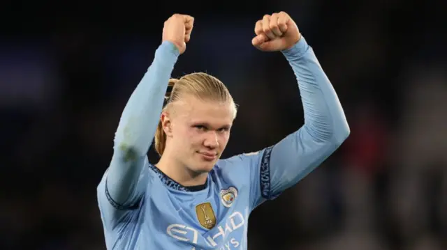 Erling Haaland celebrates after scoring for Man City