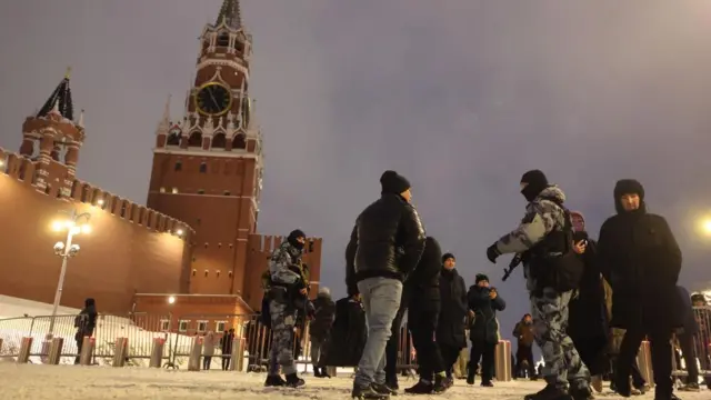 Russian police officers patrol in Moscow's Red Square