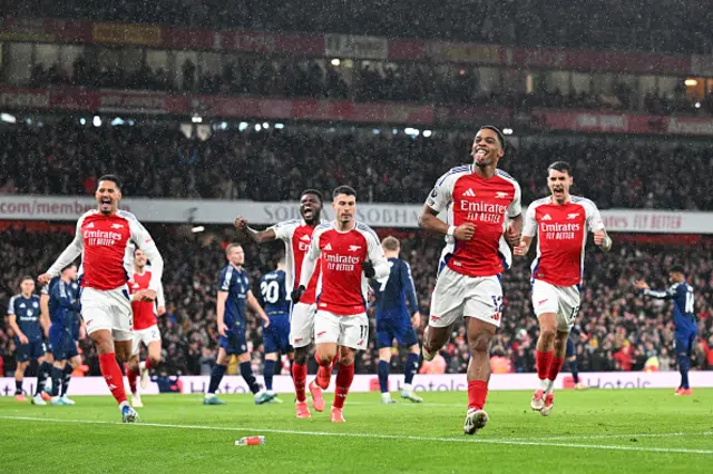 Jurrien Timber of Arsenal celebrates