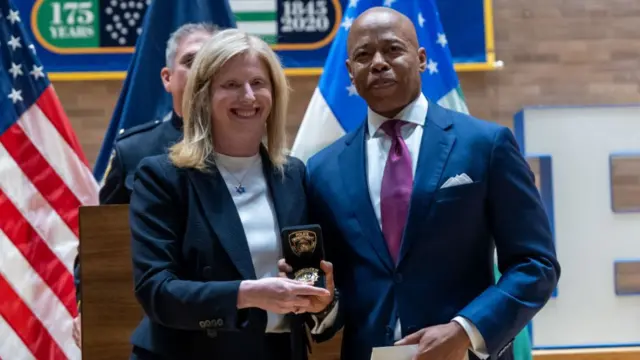 Jessica Tisch stands next to New York City Mayor Eric Adams after he announces her as the next NYPD commissioner