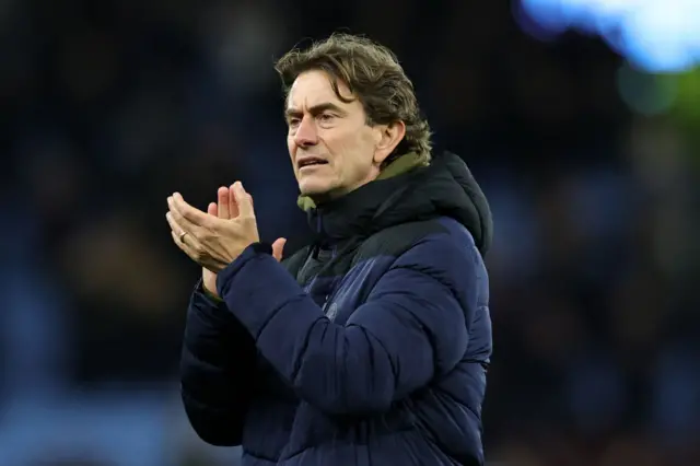 Thomas Frank, Manager of Brentford, applauds the fans