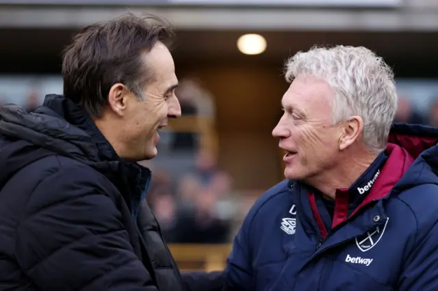 Julen Lopetegui smiles with David Moyes