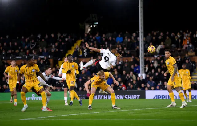 Muniz flies over the back of van Hecke