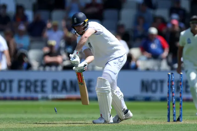 Zak Crawley is bowled by Matt Henry