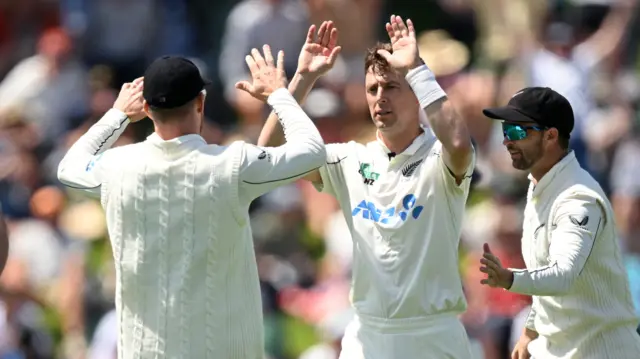 Matt Henry celebrates bowling Zak Crawley