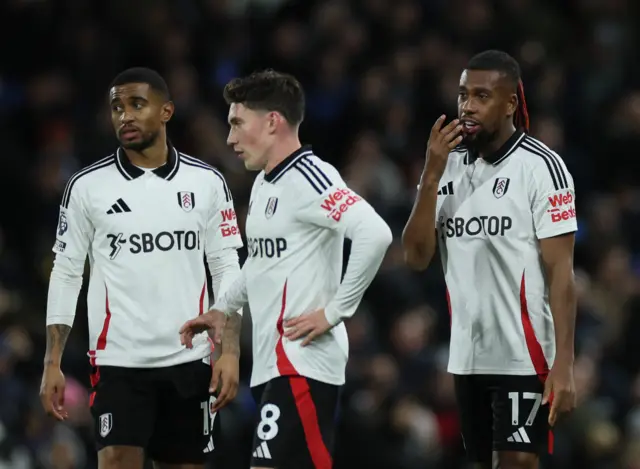 Wilson Iwobi and Nelson react to a missed chance