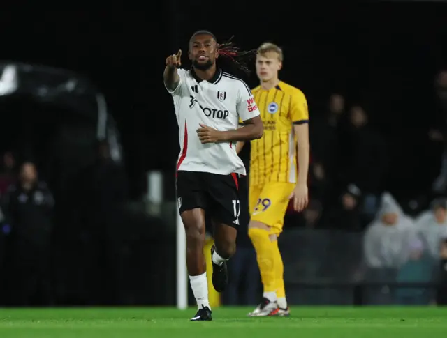 Iwobi celebrates his goal v Brighton