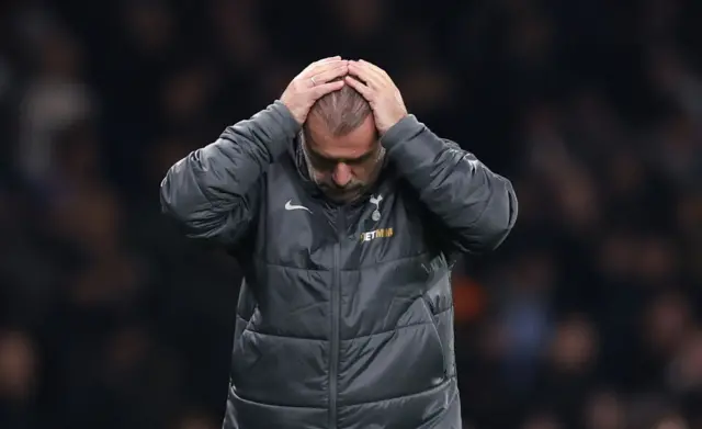 Ange Postecoglou puts his hands to his head