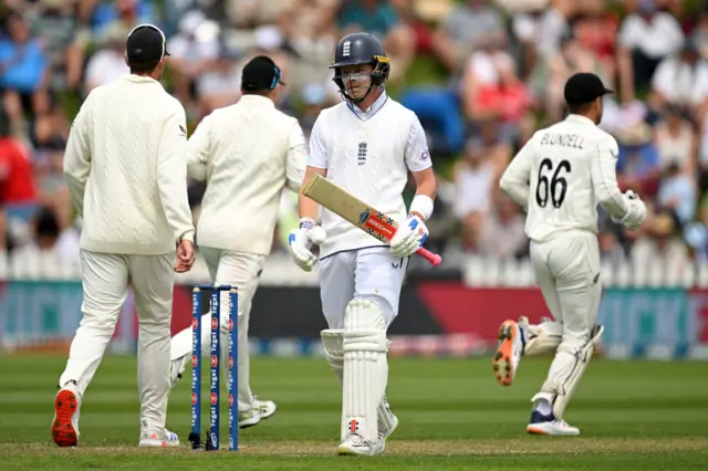 Ollie Pope walks off after being dismissed