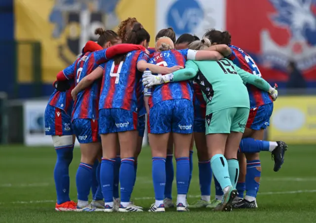 Crystal Palace women stood in a huddle