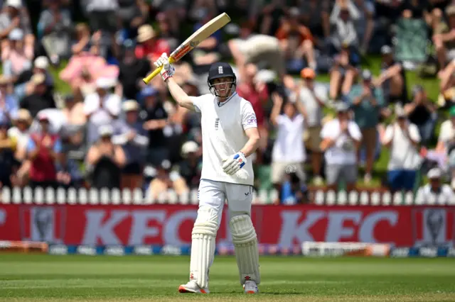 Harry Brook celebrates his half-century