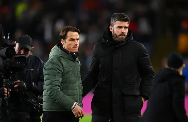 Burnley manager Scott Parker greets Middlesbrough manager Michael Carrick