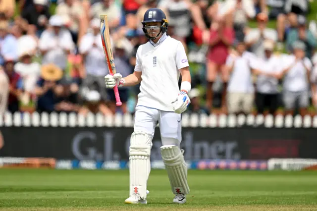 Ollie Pope celebrates his half-century