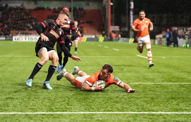 Wes Goosen dives short of the Gloucester try line