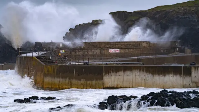 High waves crash into Portstewart harbour