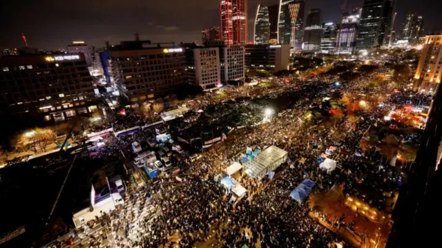 The crowd of protesters outside the National Assembly has swelled