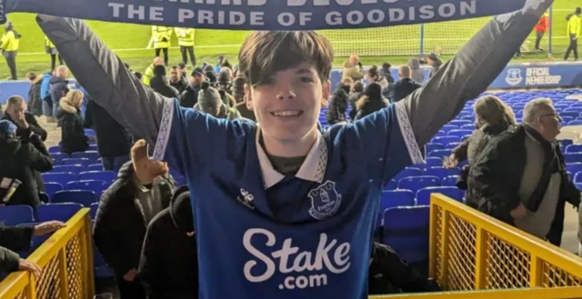 Everton fan with scarf