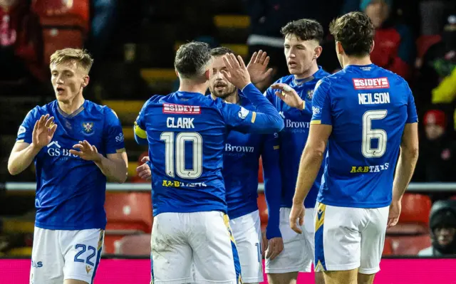 St Johnstone's Makenzie Kirk (C) celebrates scoring to make it 1-0 with teammates (L-R) Matt Smith, Nicky Clark and Lewis Neilson during a William Hill Premiership match between Aberdeen and St Johnstone at Pittodrie