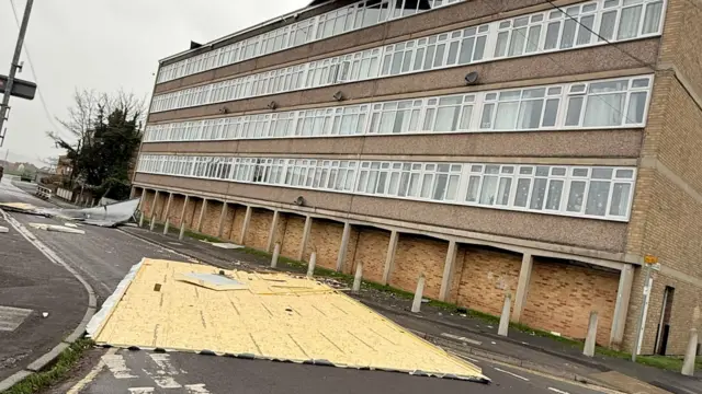 Panels blown off the roof of a block of flats