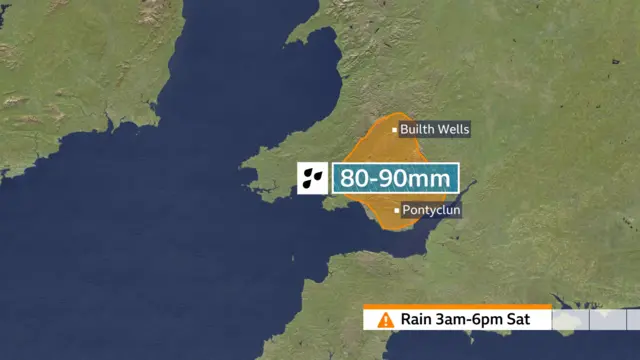 A map shows that an amber warning 90mm rainfall in Wales