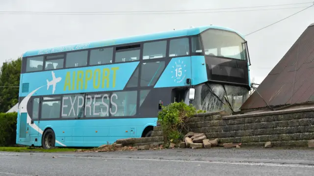 A bus with the words "airport express" and